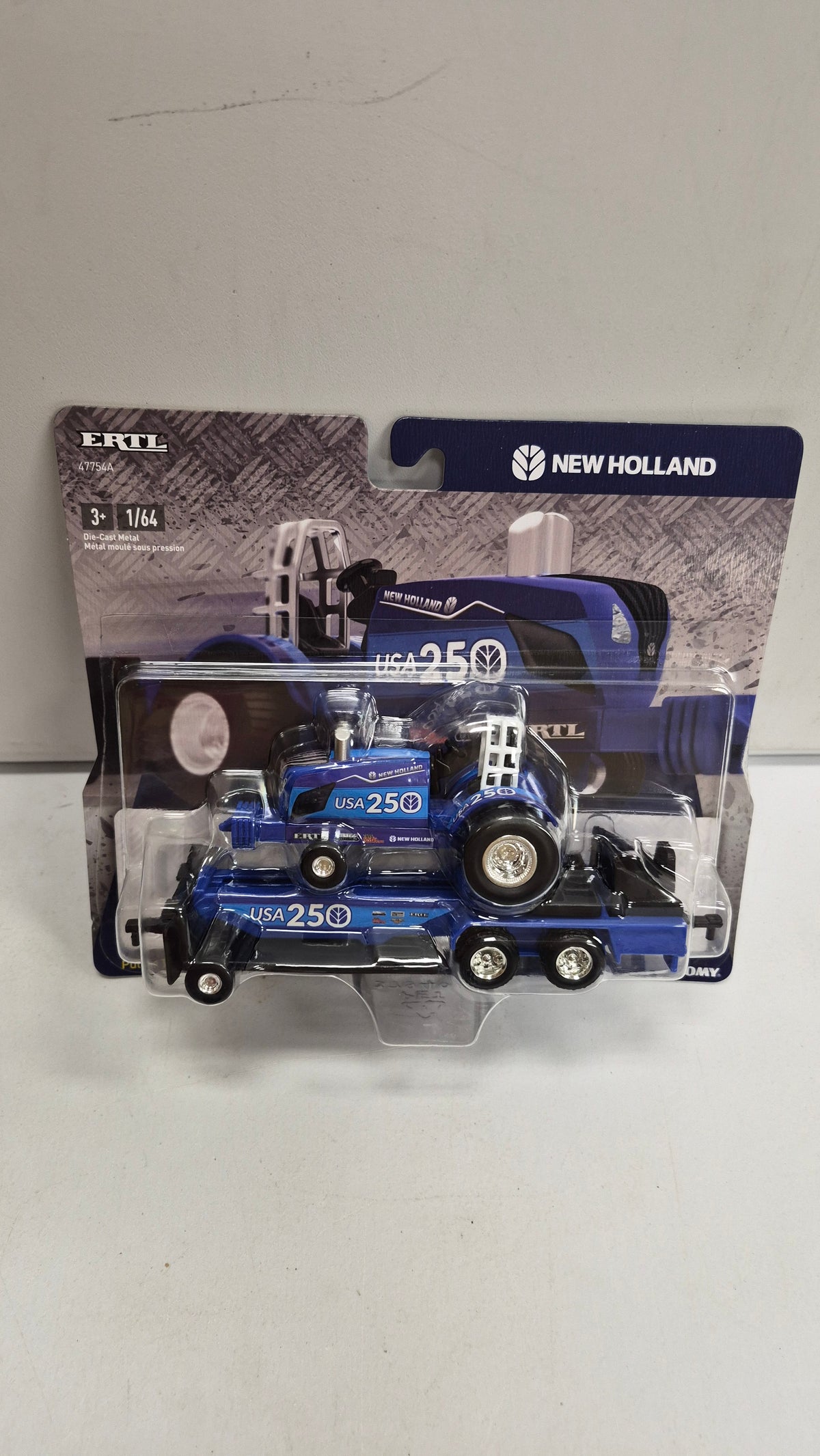 New Holland USA 250 puller tractor and sled