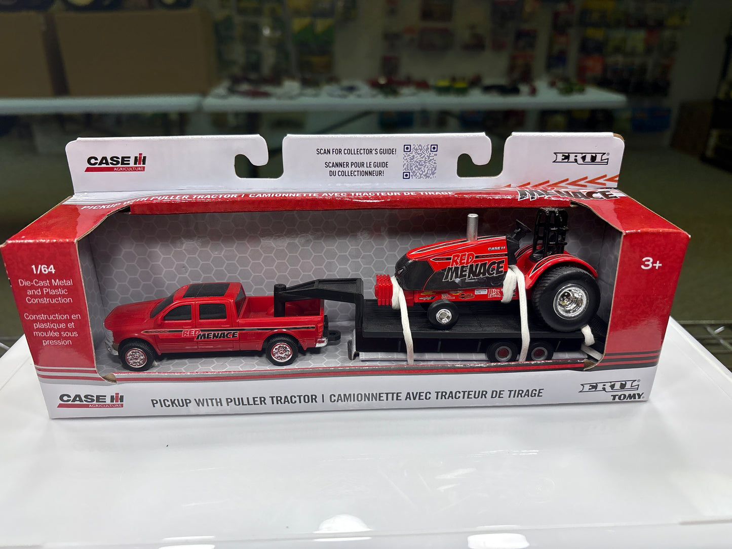 Model truck set in packaging with 'Case' branding on a white surface.