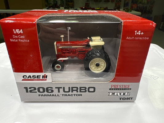 Boxed Case IH 1206 Turbo farmall tractor model on a white surface