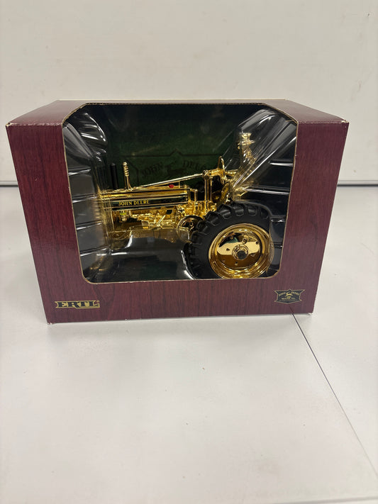 John Deere Model “A” w/ man commemorative gold edition