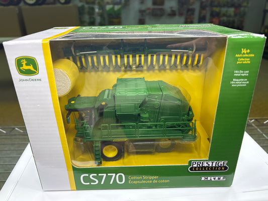 John Deere CS770 Cotton Stripper toy model in packaging with John Deere logo.